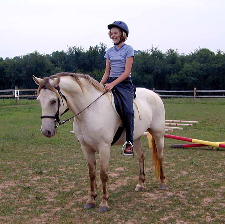 Photo of Samantha sits on her horse Sugar